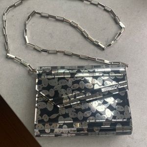 GOING ..GOING . Jimmy Choo black/silver clutch with optional silver chain strap.